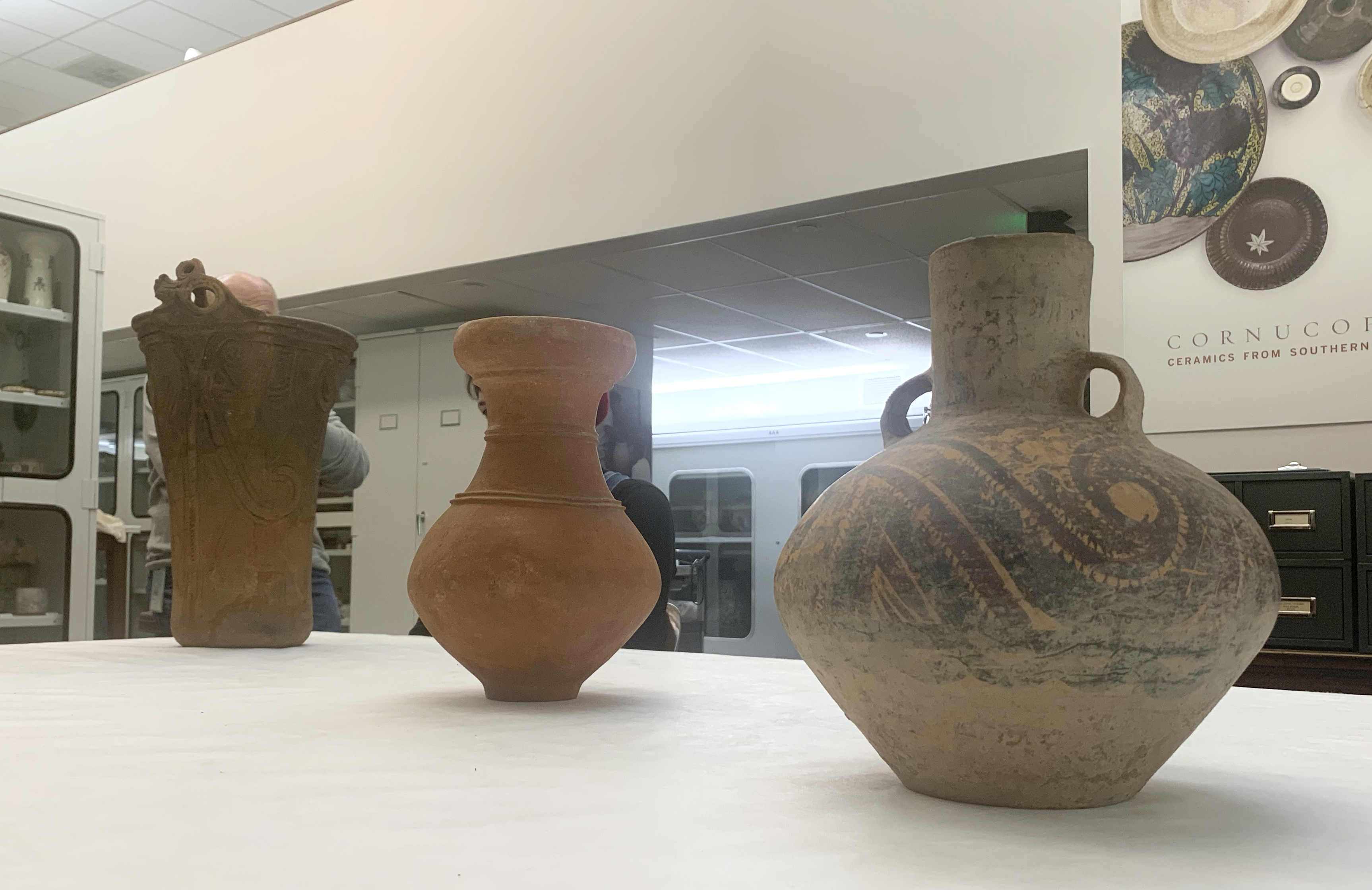 Freer Gallery pots representing Chinese Neolithic Period, Japanese Yoyoi Period, and Japanese Jomon Period