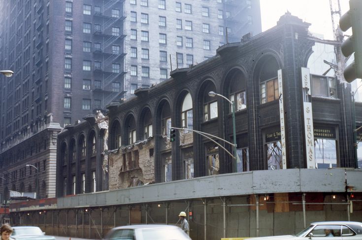 Photo of the Chicago Stock Exchange Building in the process of being demolished, following a lengthy court battle to have it recognized as an official landmark. 