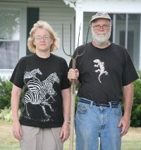 Susan Marks Schmidt '81 and husband John re-enact American Gothic on their farm