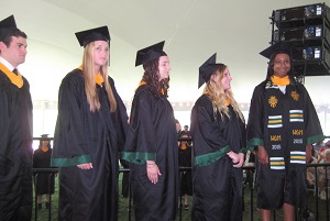 Biology graduates line up to receive diplomas