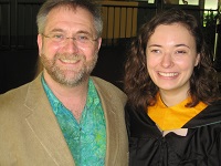 Dr. Mark Forsyth (shown here with Claire Tocheny '15) returns from a year's sabbatical to attend graduation