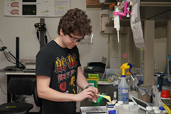 Dylan Springer, a biology master’s student in the Wawersik lab. (Photo by Stephen Salpukas)