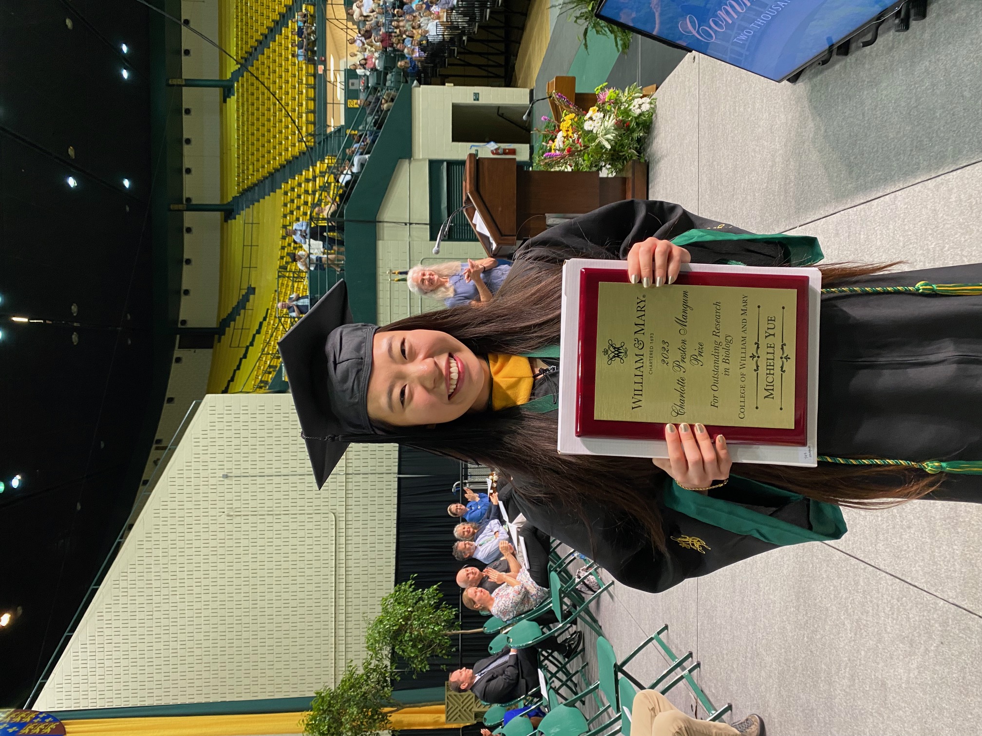 Michelle Yue ’23 poses with her Charlotte Preston Mangum Prize plaque at the Biology Diploma Ceremony.