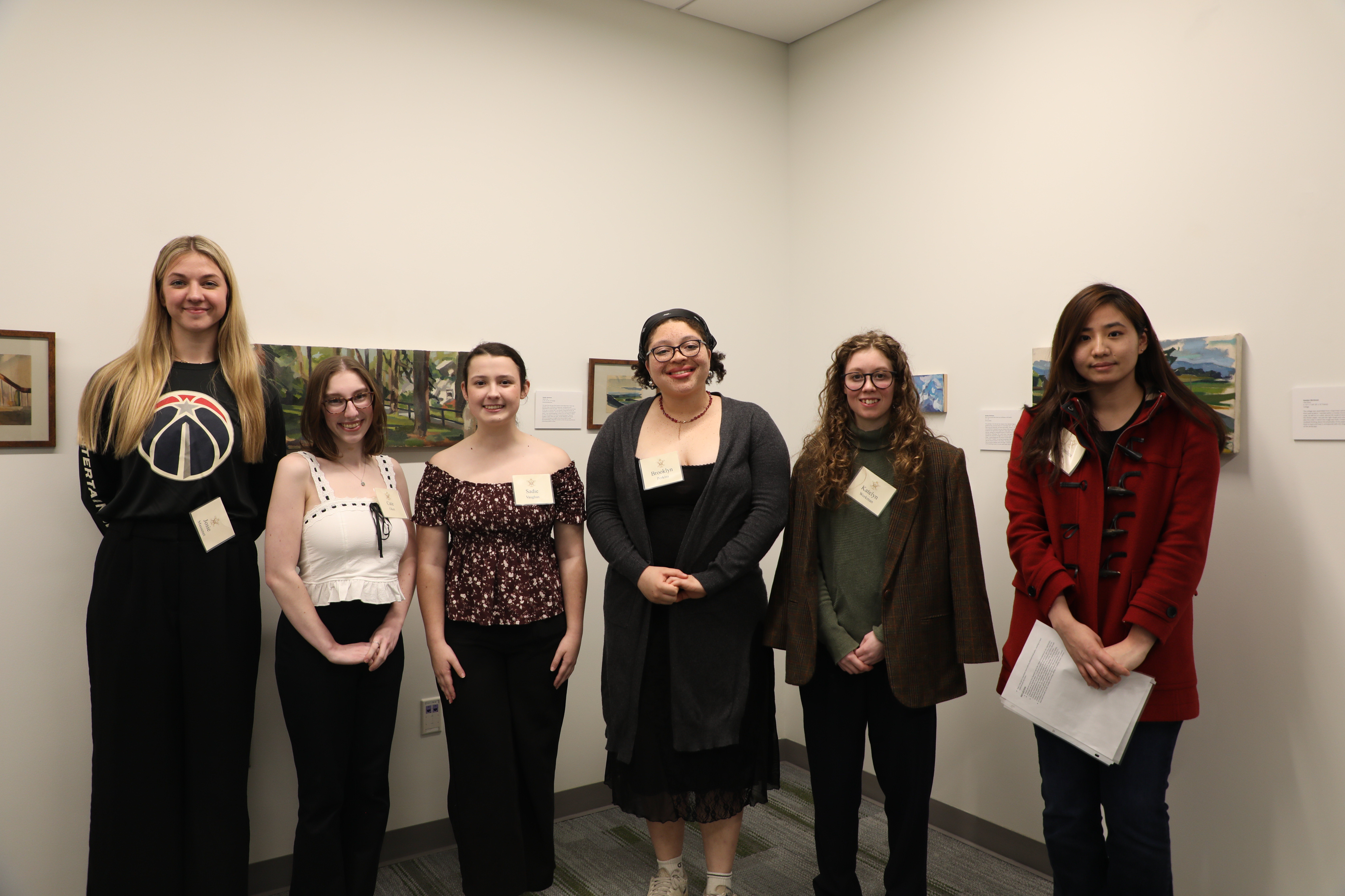 2025 Catron Scholars (from left to right) Josie Massenet F '25, Cate Oken '27, Sadie Vaughn '27, Brooklyn Perkins '26, Katelyn Workman '27, and Angelina Joa '26 come together at the close of this year's Catron Scholars Reception Nov. 13 in Sadler Center's Hart Gallery. (Photo by Adeline Steel)