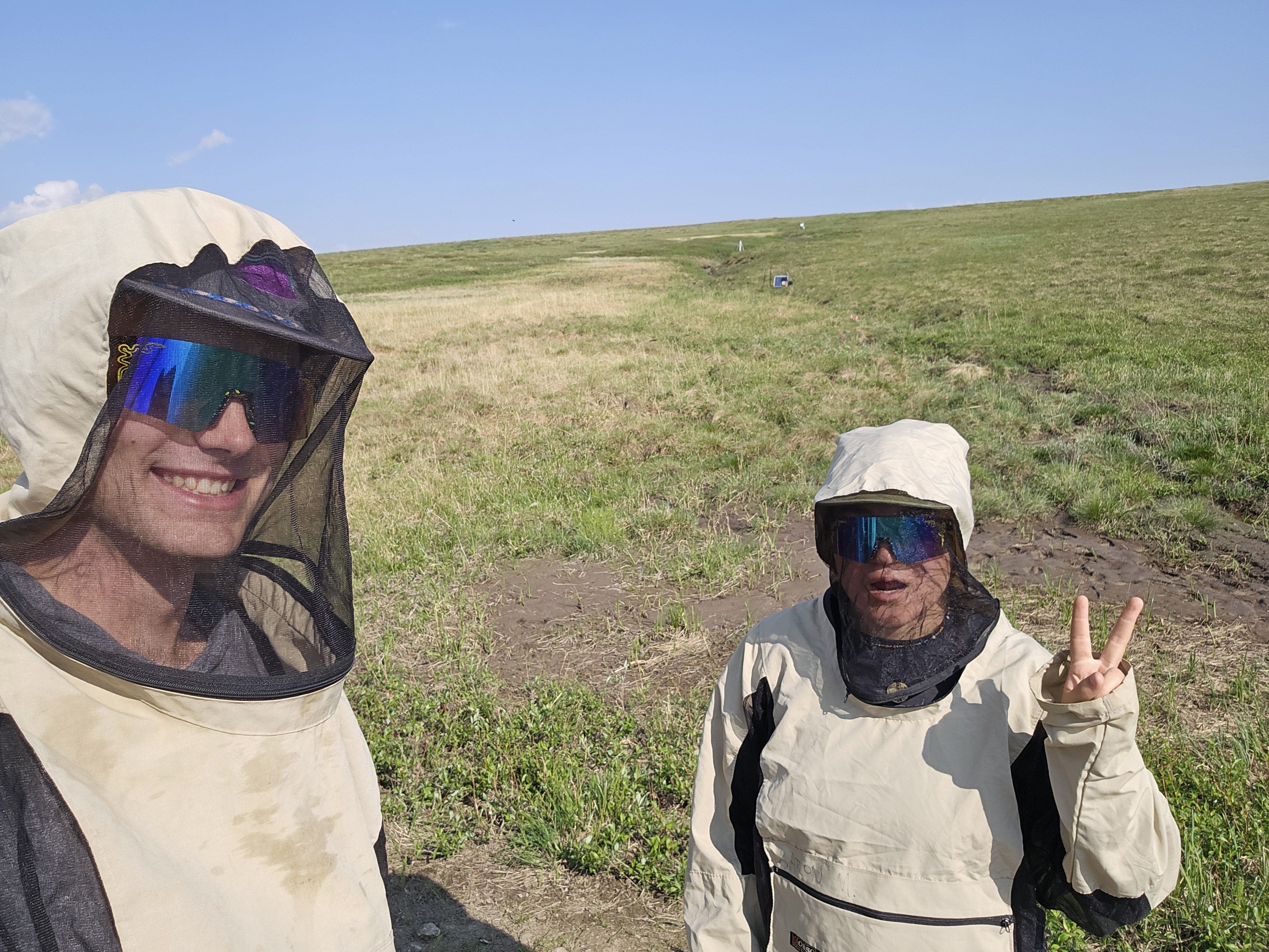 Addison Greenfield '26 (left) and Aayla Kastning '26 (right) examine Arctic water tracks at the Toolik Field Station in northern Alaska last summer as part of the geomorphology lab with Assistant Professor of Geology Joanmarie Del Vecchio. (Courtesy photo)