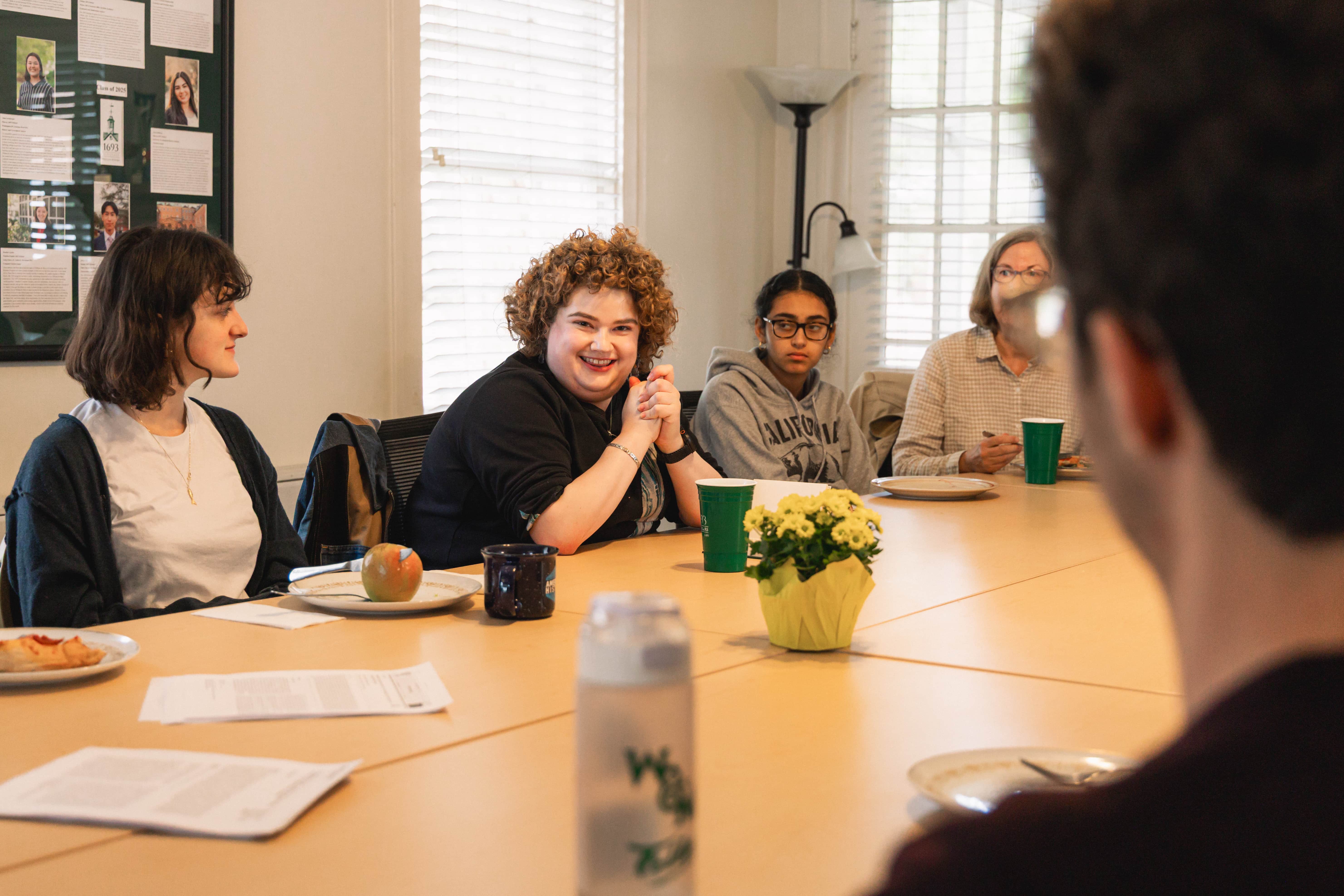 Dietz discusses the importance and power of people-centered reporting over lunch with 1693 Scholars in Murray House Oct. 27. (Photo by Samuel Li)