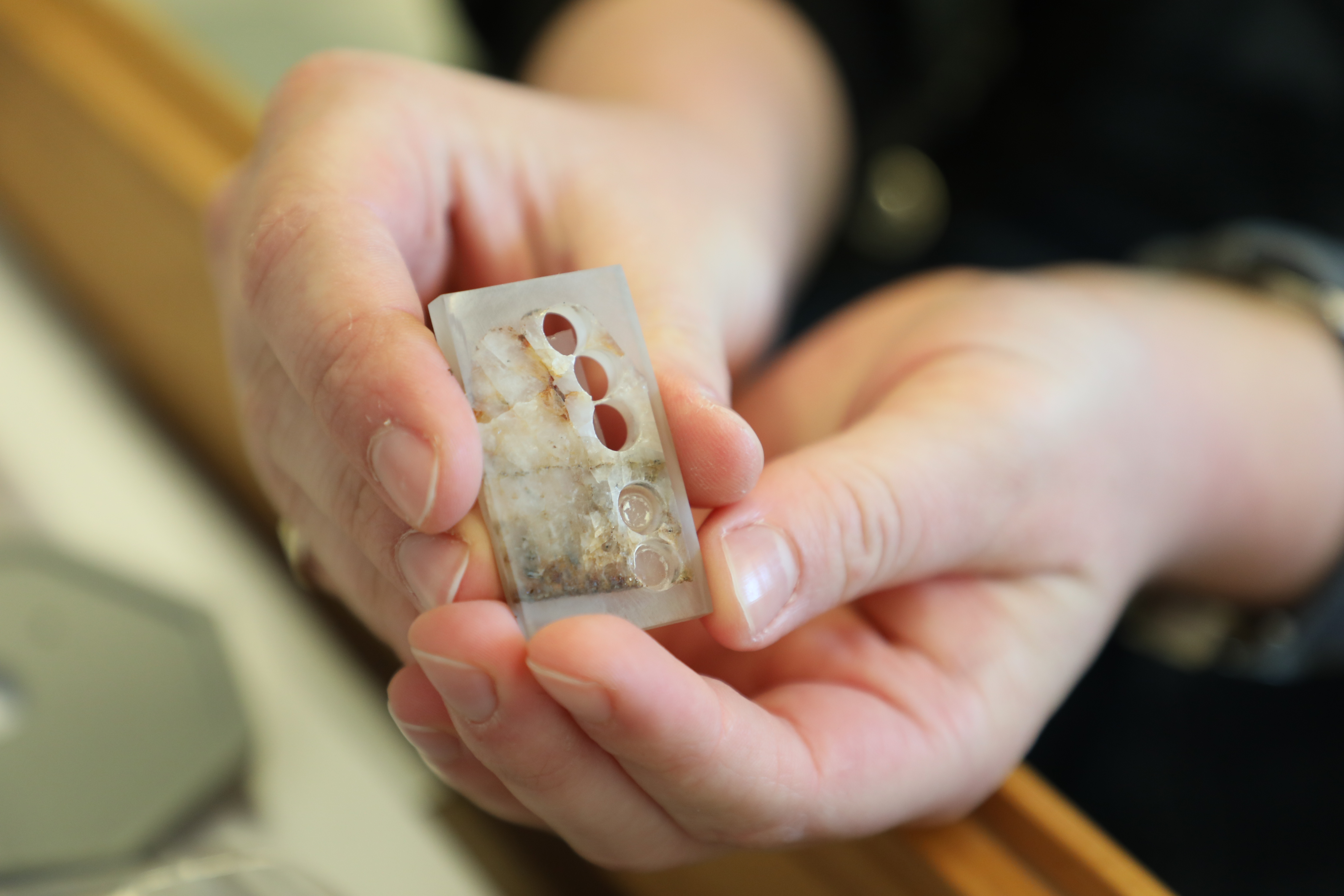 Ashurkoff studies the geologic formation and sourcing of "ecofacts," clusters of naturally occurring crystals discovered at James Madison's Montpelier. (Photo by Adeline Steel)