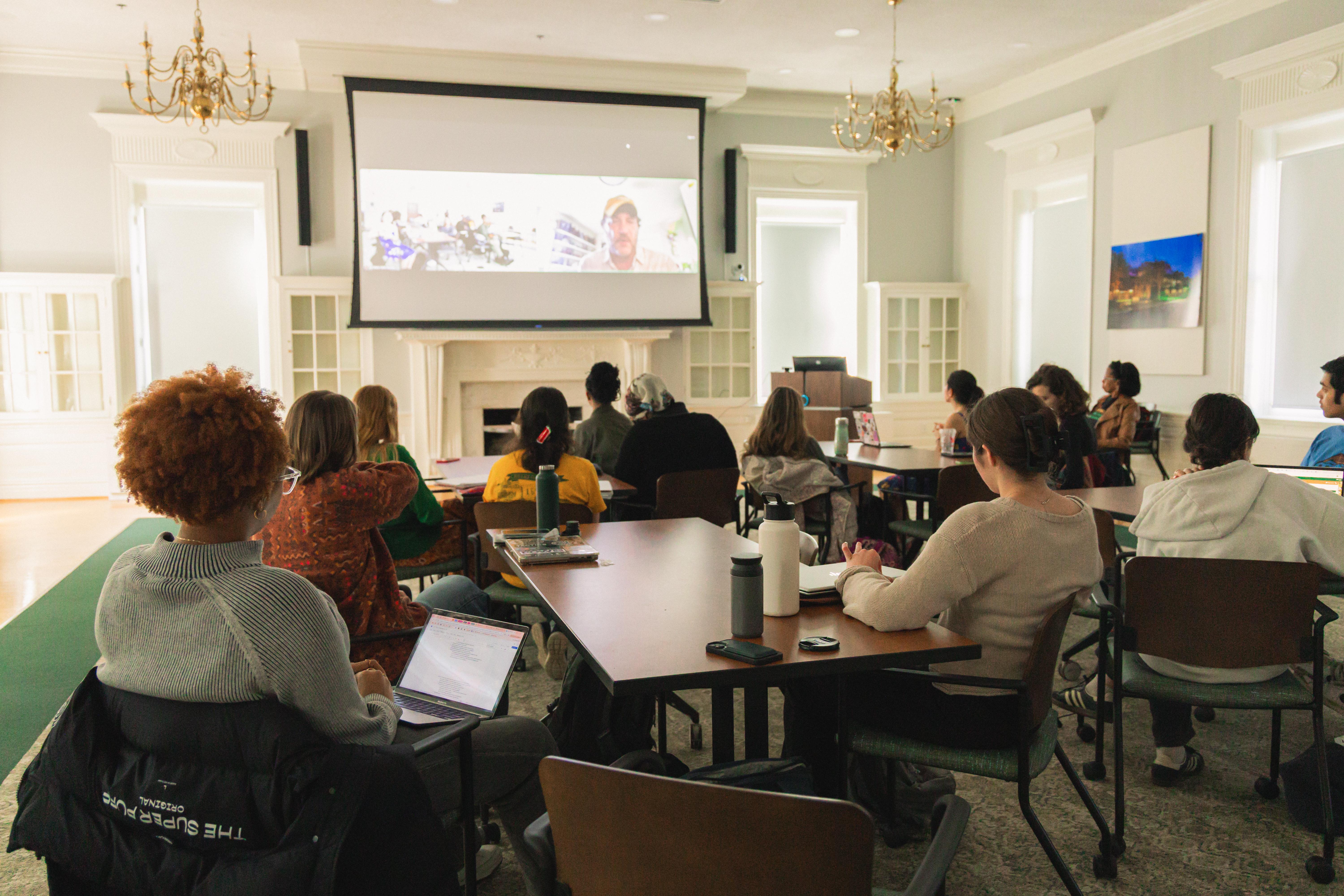 Award-winning Virginian-Pilot staff photographer Stephen M. Katz discusses via Zoom his unusual career path from social worker to photojournalist, March 21 in the Grimsley Board Room. (Photo by Samuel Li)
