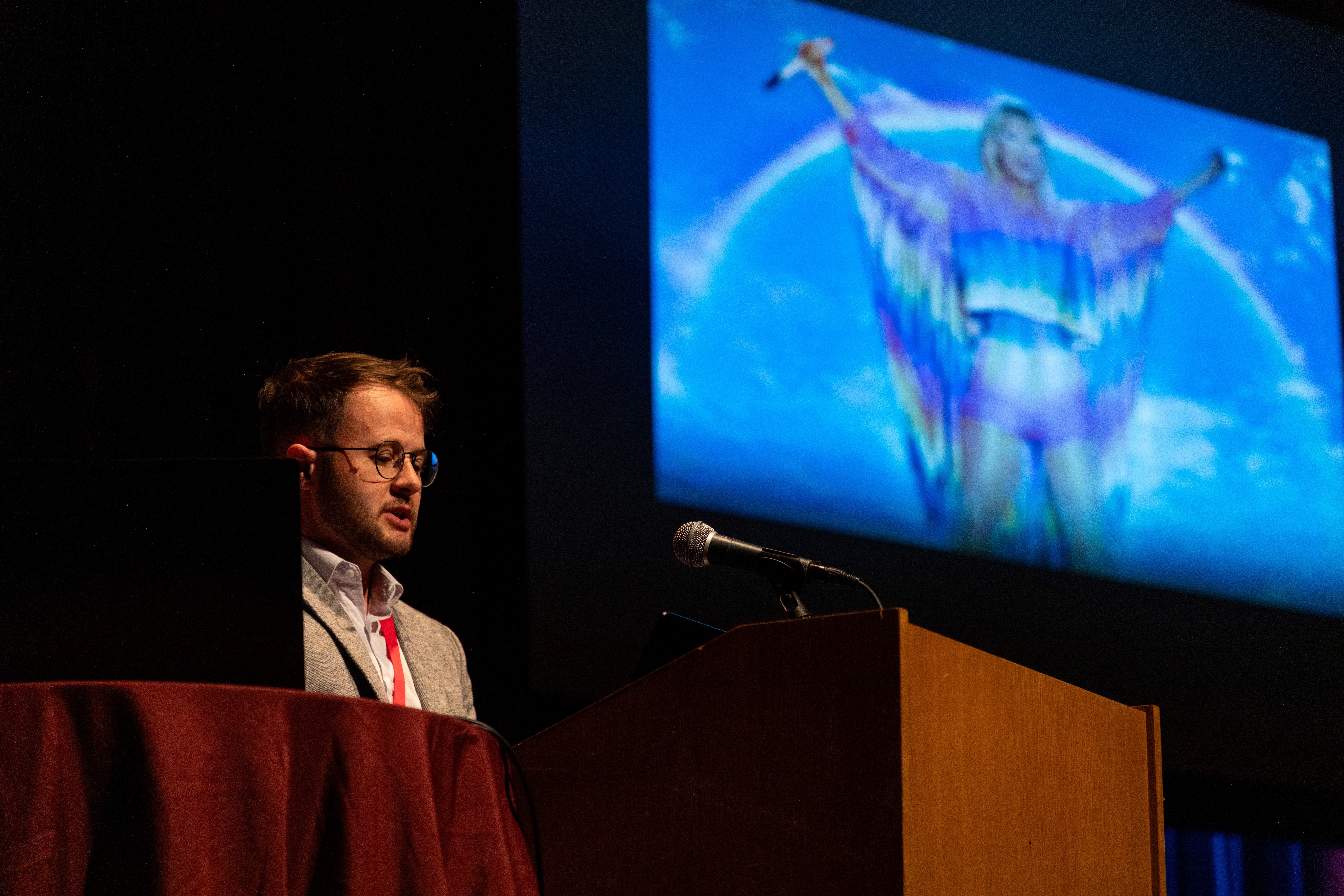 Jay Jolles, PhD candidate in American Studies and chair of the Graduate & Honors Research Symposium organizing committee, researches music as a tool for surveillance. (photo by Ethan Gill)