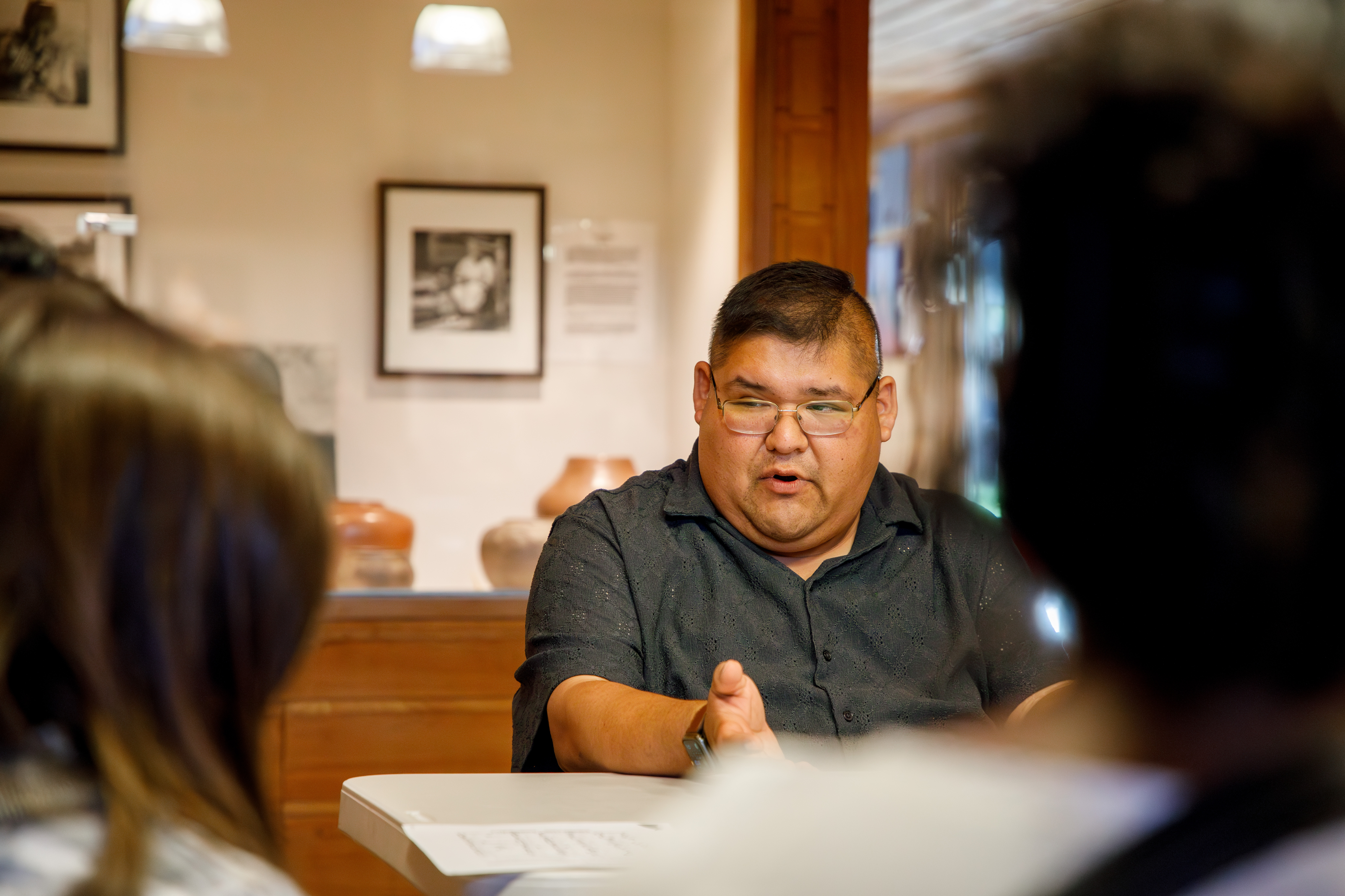 New Kituwah Academy Cherokee language teacher Matt Tooni discusses characteristics of the Cherokee language and contemporary efforts to preserve and teach it to youth and adult second-language learners. (Photo by Grace Helmick)
