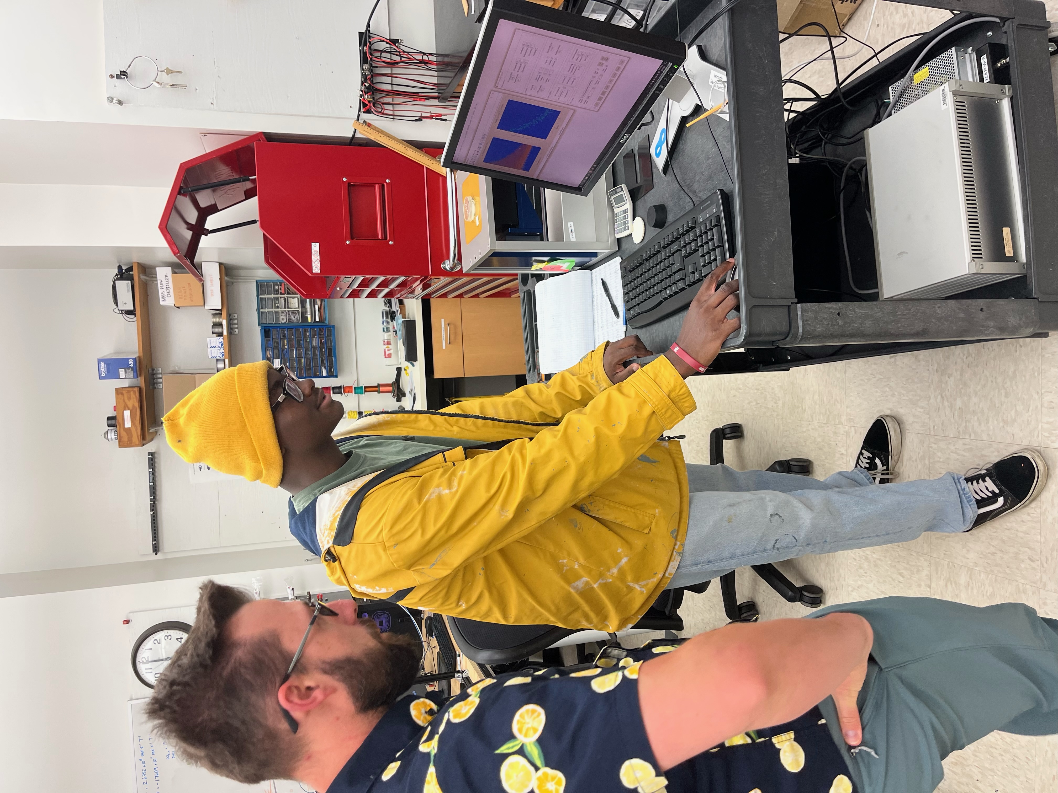 Stamps 1693 Scholar Shalom Akolatse ’26 (right) received funding through the Charles Center, the 1693 Scholars Program, and the Stamps Scholars Program, to pursue summer research with Associate Professor of Chemistry and Director of Undergraduate Research Tyler Meldrum (left). (Courtesy photo)