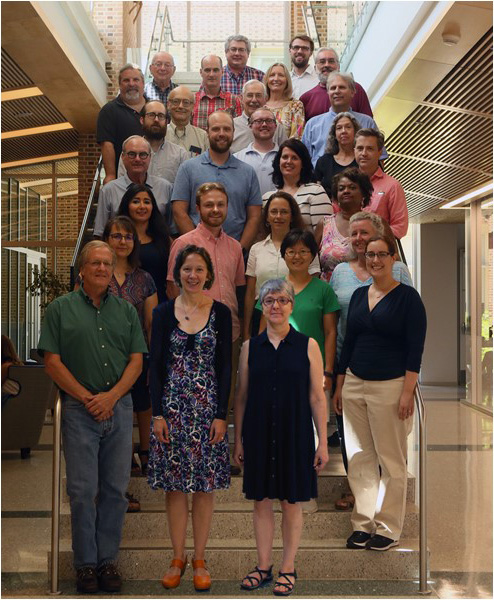 Photo of Chemistry faculty and staff standing in ISC atrium.