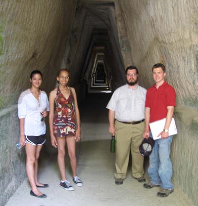 Summer 2010 students at the Cave of the Sibyl in Cumae, Italy (l-r): Lena Srestha, Irene Morrison-Moncure, Brent Bickings, and John Kelly.