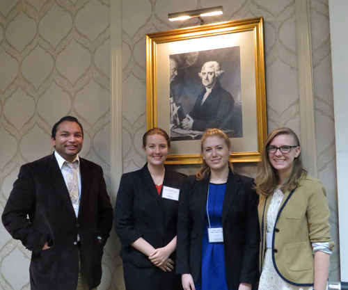 Tejas Arelare ('16), Callie Angle ('16), Victoria Jansson ('16) and Maura Brennan ('16) pose before a fellow W&M alumnus (1762) at the CAMWS-SS conference in Fredricksburg.