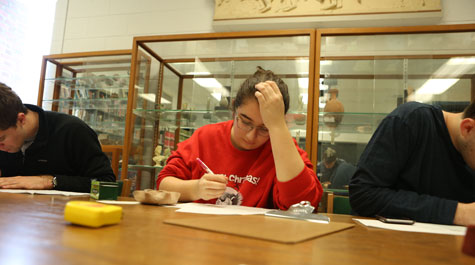 Archaeology Students Work with Artifacts