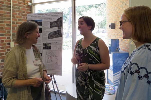 Dr. Laurie Rush chats with students at Archaeology Day