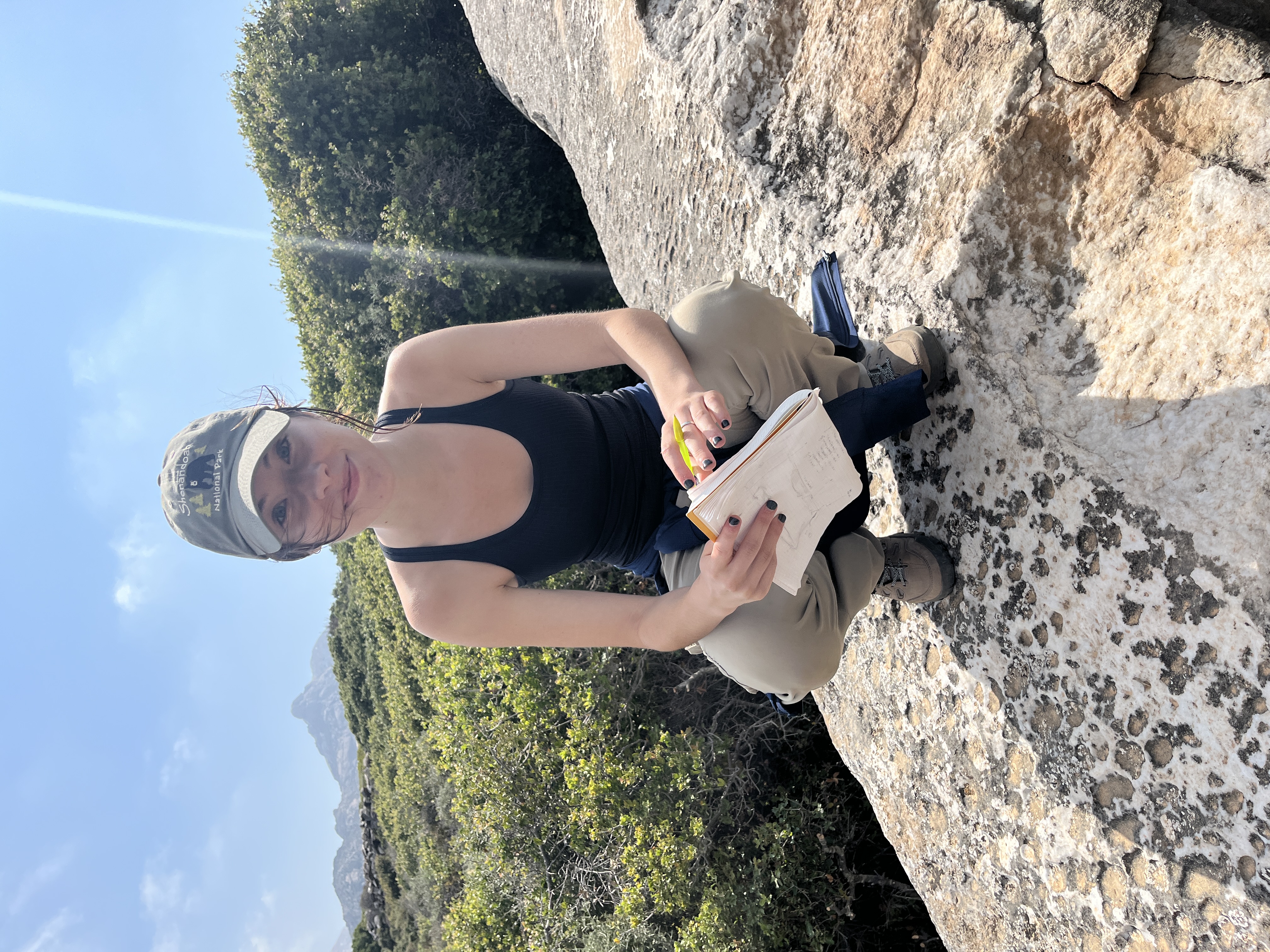 Maya taking notes and measurements at the monolith (photo by Jess Paga)