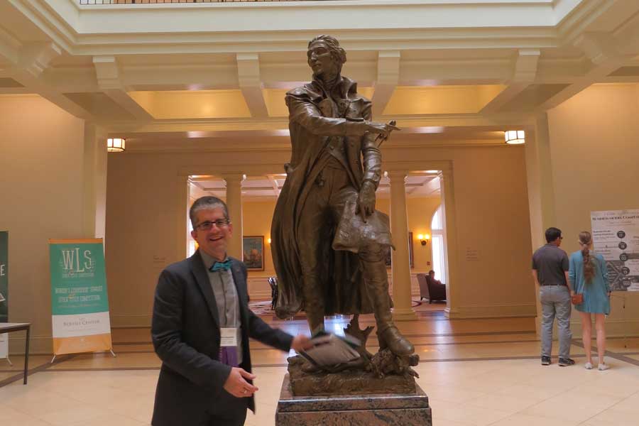 Edward Cook with Pierre L'enfant's statue in Miller Hall