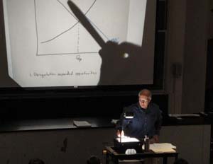Professor Haulman teaching his last Principles of Economics class
