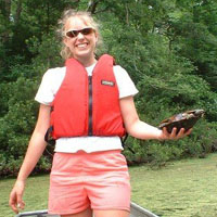 Emily Thompson '06 surveys turtles on Lake Matoaka, during her undergraduate days.