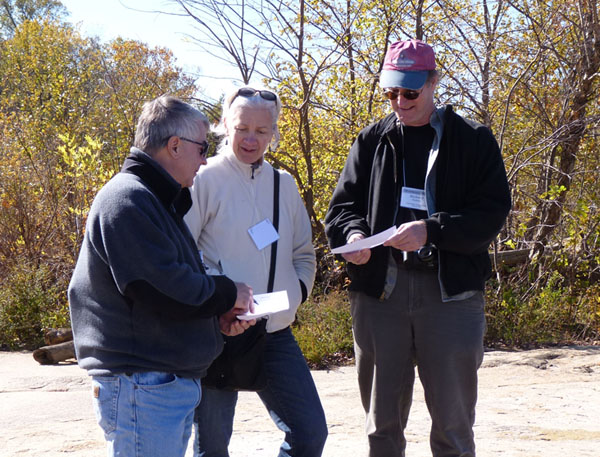 Russ McDaniel ('79), Mary Horan, and Rich Walker ('79) collaborate during the field trip.