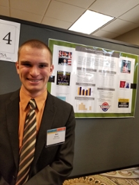 Dan Brown ’19 presents his research titled “The Effect of Facebook Posts on Partisan Polarization.”