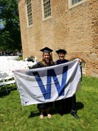 Chloe Madvig and Paul Manna with Chicago Cubs Win flag