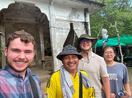 (From left to right) Students Charles Miller ('29), Nicholas Valyayev ('27), and Hannah Yang ('28) with San Chey, their supervisor at ANSA Cambodia