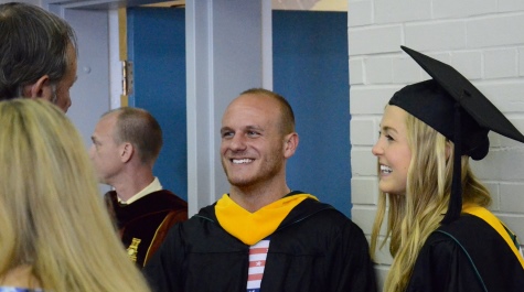 Grads speaking with Prof.