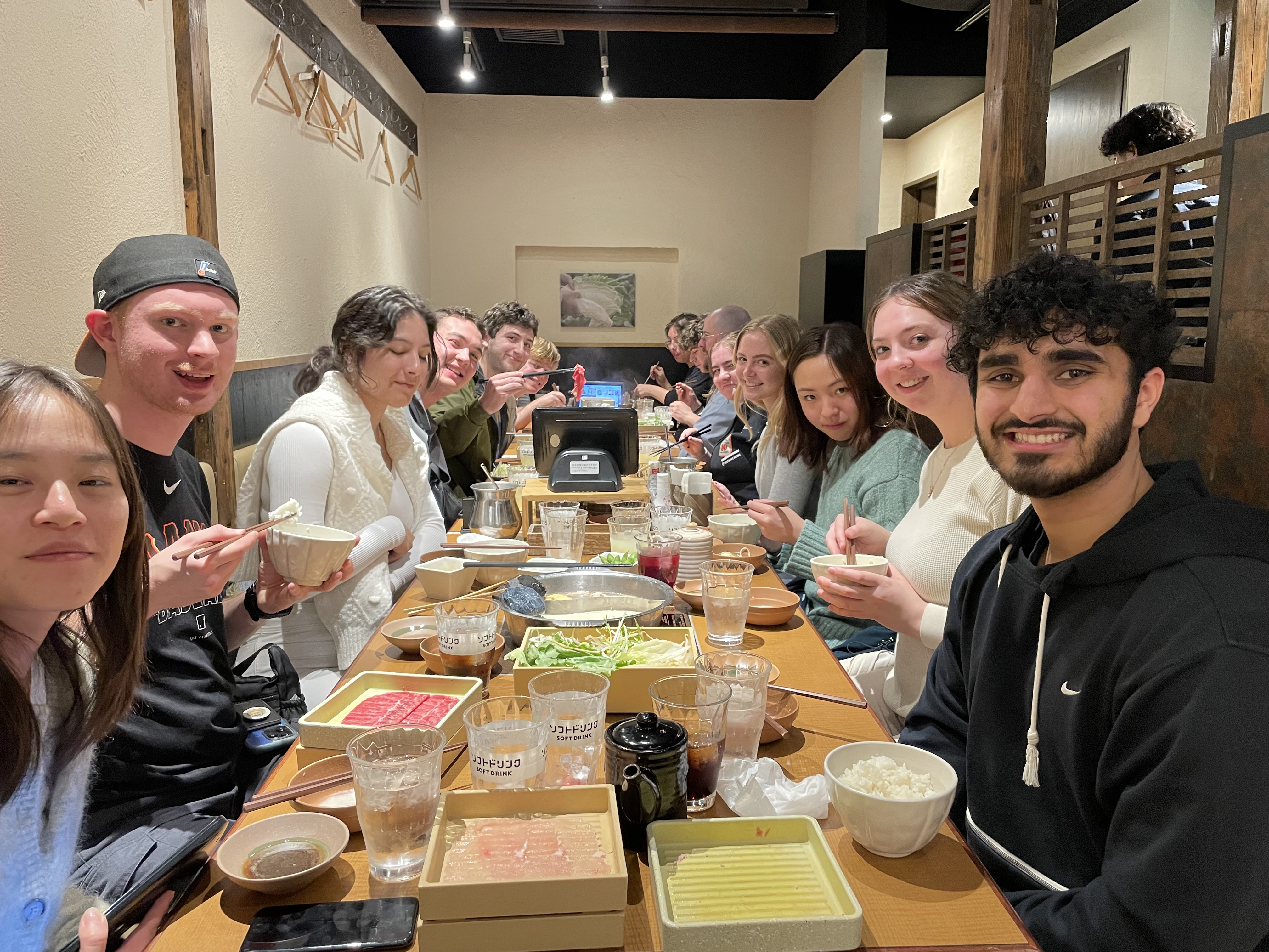 The group dined at a Shabu-shabu restaurant in Osaka, experiencing authentic Japanese cuisine.