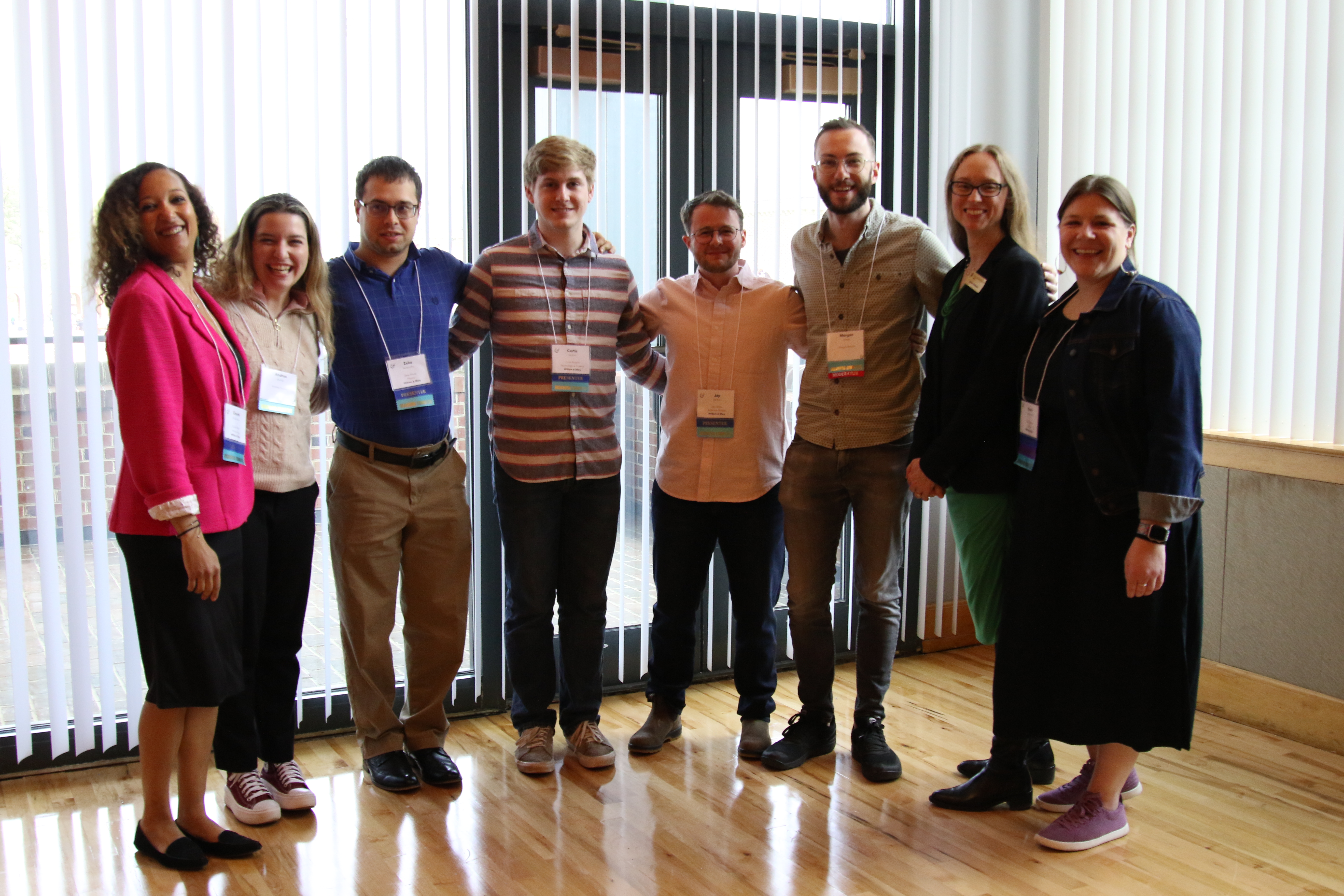 Pictured: the Graduate Organizing Committee, left to right, Chardé Reid, Andrea Zourou, Zeke Wertz, Curtis Rogers, Jay Jolles, Morgan Brittain, Marie Pellissier) with Sarah Glosson, second from right