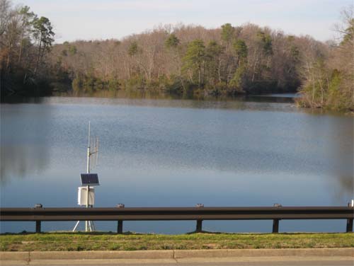 Keck Laboratory monitoring station set up next to a body of water