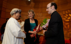 Rasmussen and Glasser Greeted by SQU President