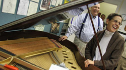 Margaret Roller visits the Steinway she donated to William and Mary's Music Department