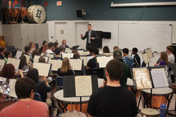 Ssgt Singer conducts the Wind Symphony