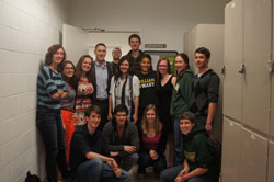 Singer with Wind Symphony members