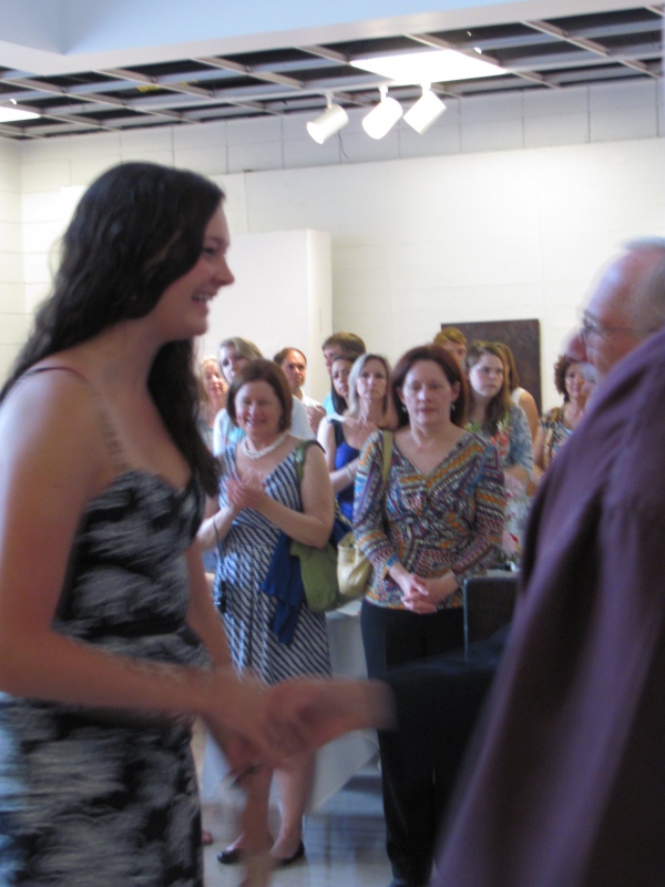 "Wear your neuron pin on your gown tomorrow!"