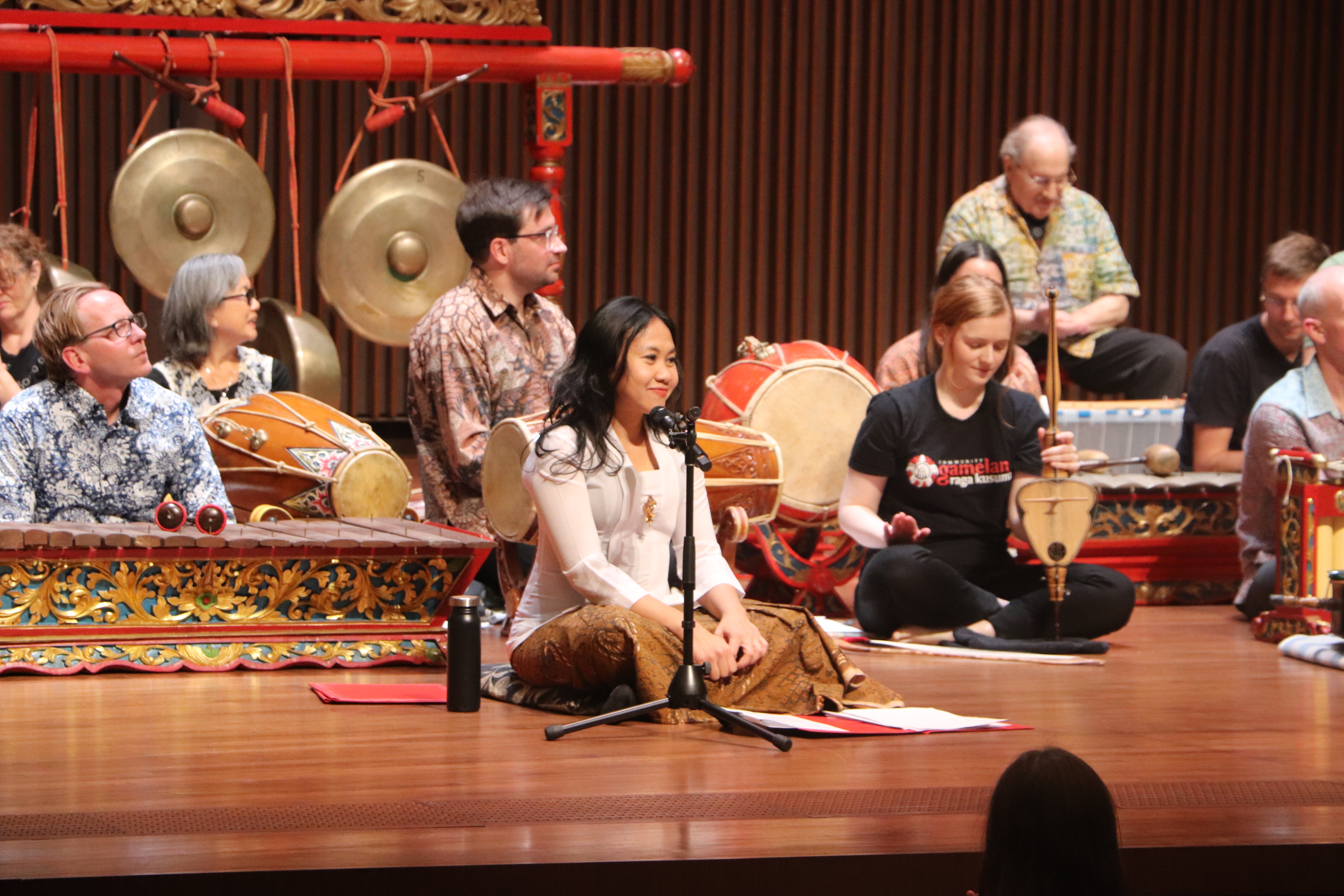 Renowned Indonesian composer Peni Candra Rini served as conductor and lead singer during the debut concert of W&M’s reunited Gamelan Ensemble, now directed by Ciao Davison (seated behind Rini). Photo credit: Rebecca Ries