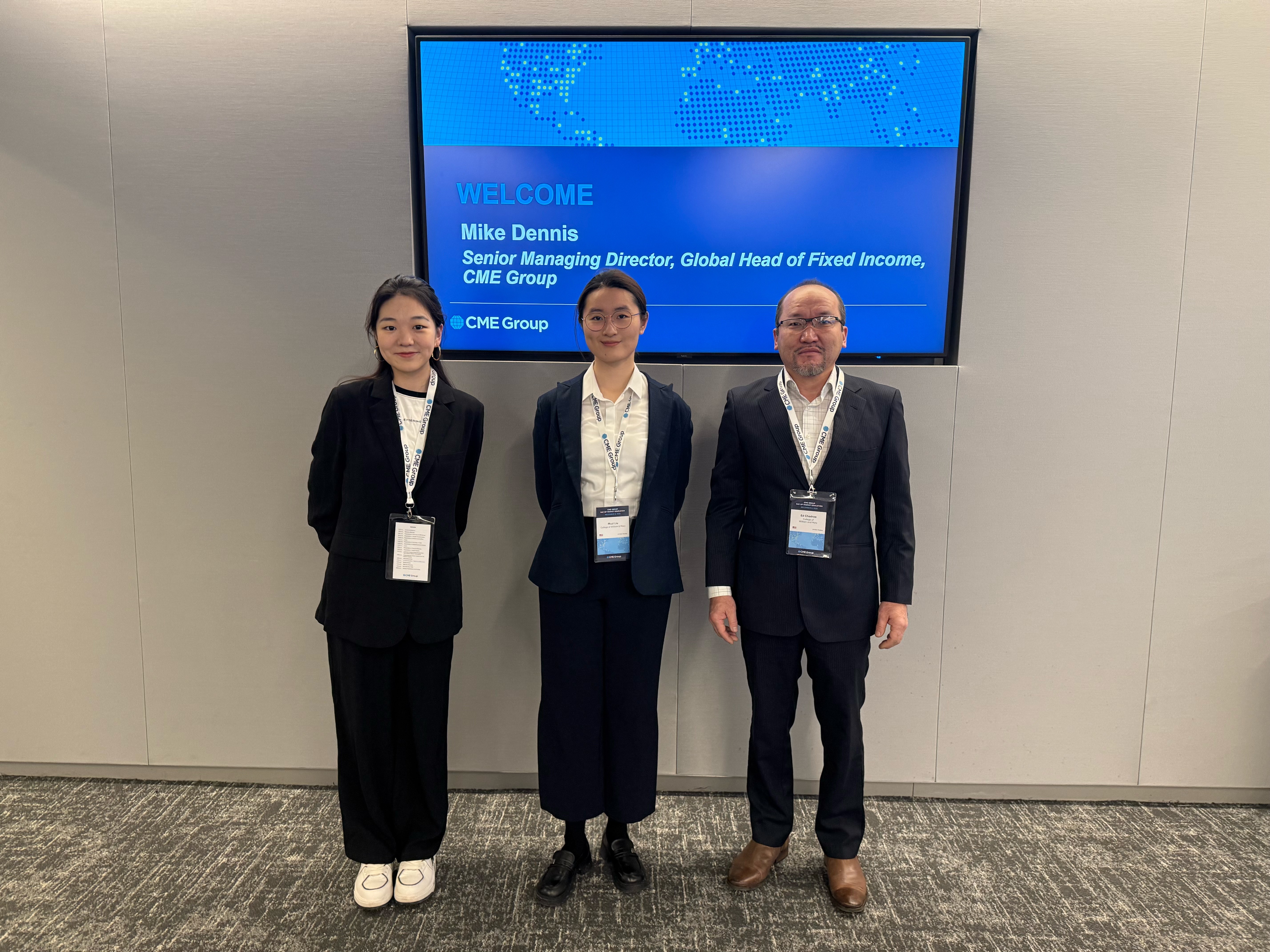 Xinyue Fu ‘26, Muzi Liu ’26 and mathematics professor Ed Chadraa at the CME Group’s Day of Market Education in Chicago on Dec. 8, 2025. Courtesy photo.