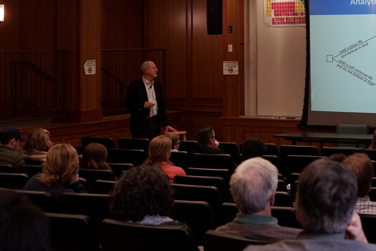 Harvey Langholtz discusses Pascal’s Wager with God, and how it can be represented with a decision tree. Photo credit: Rebecca Ries