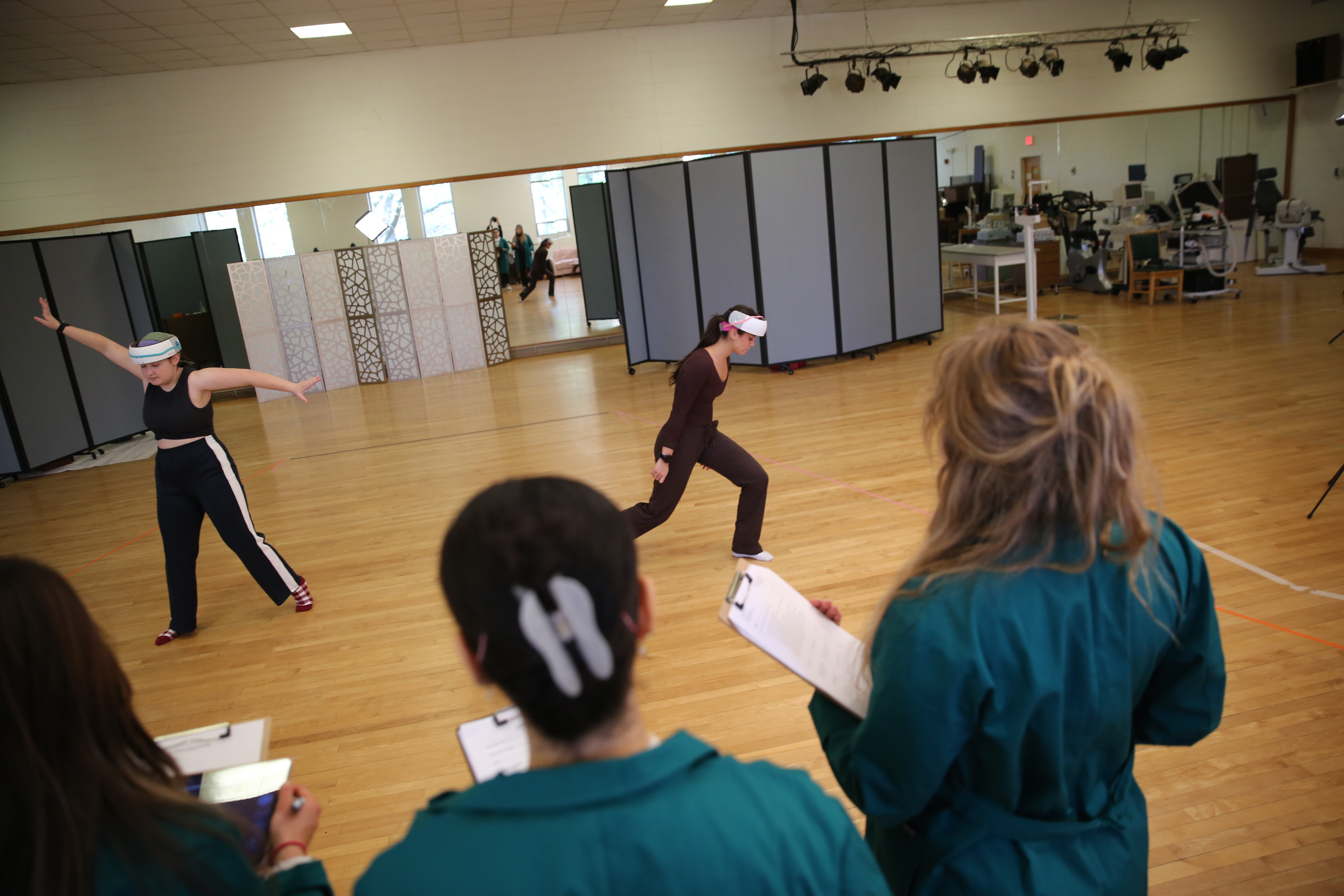 The study participants performed choreographic tasks while the student researchers collected data. Photo by Stephen Salpukas.