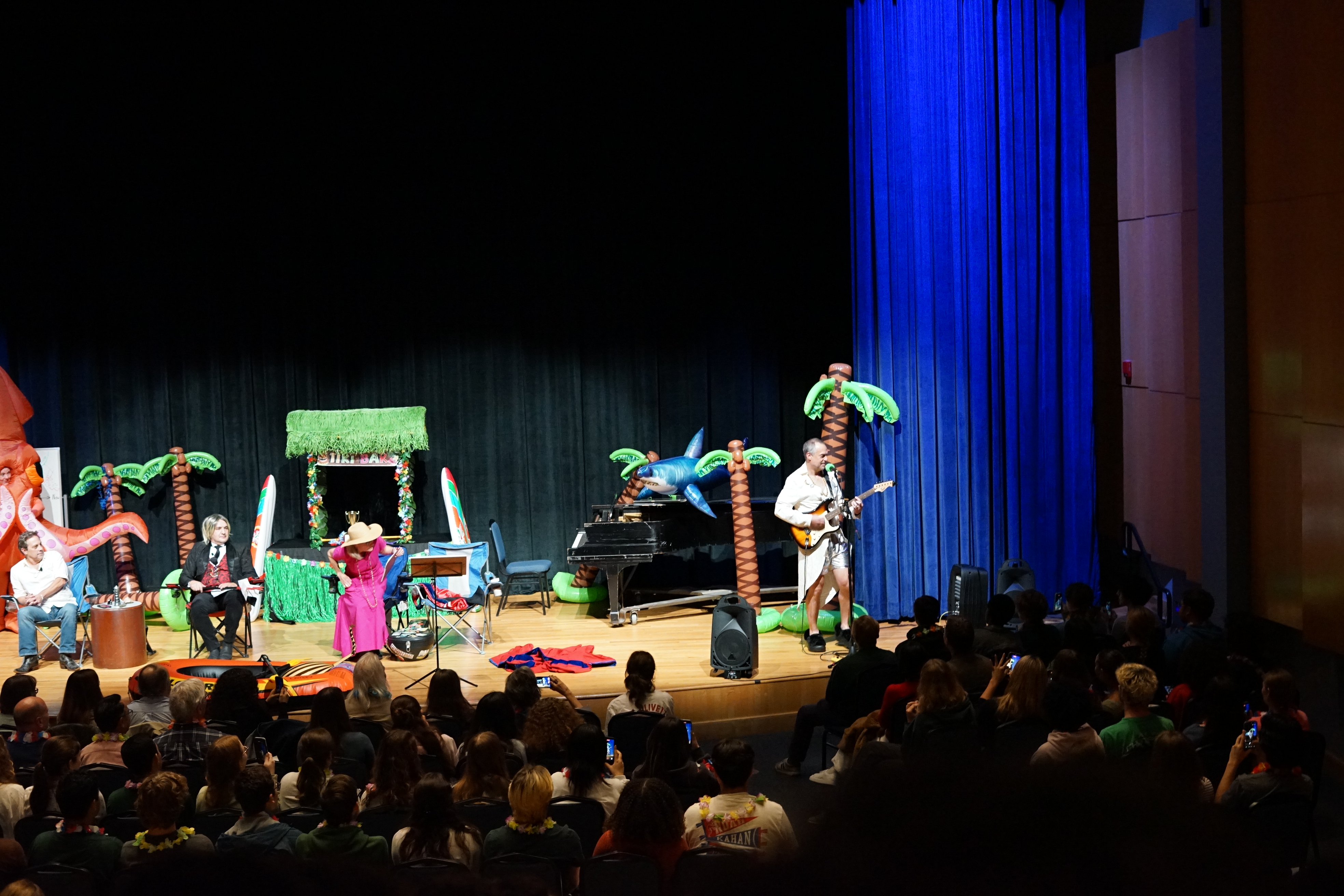 The audience was treated to two live performances by Peter Vishton, who wrote his own social science parodies of popular songs.