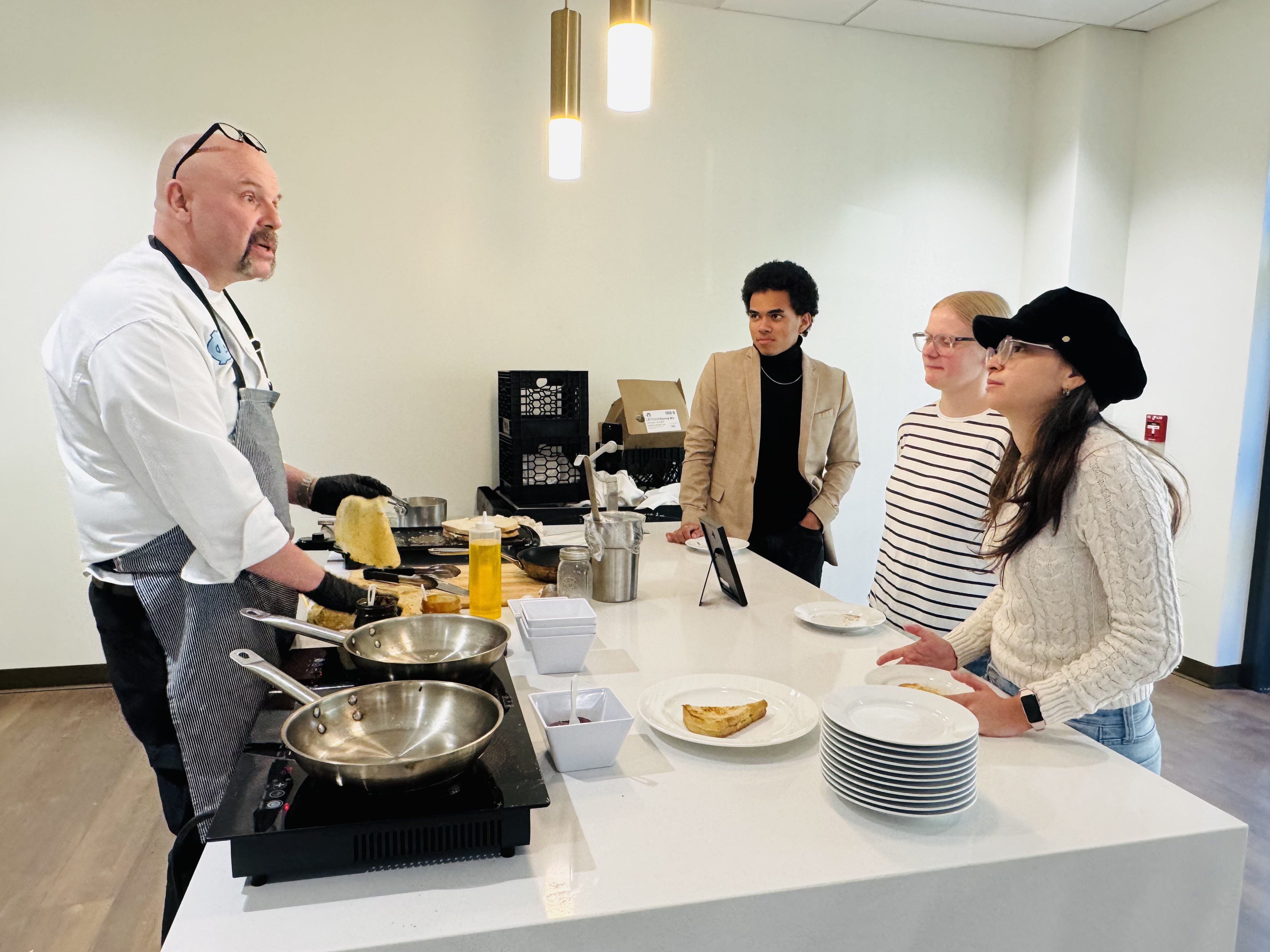 Chef Chiron cooks crepes for W&M students. Photo by Deborah Lee-Ferrand.