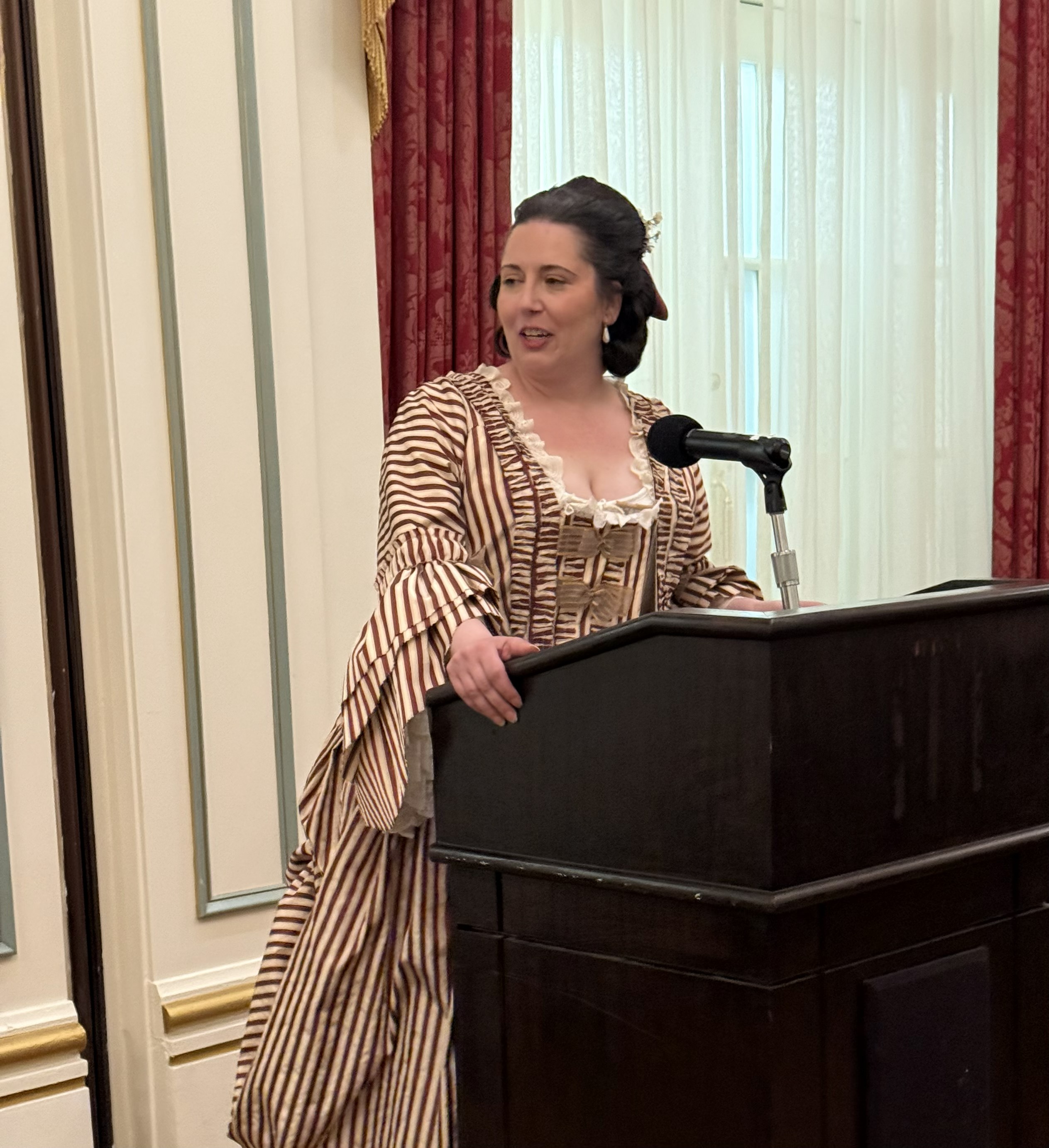 Kelly Brennan, M.A.'06, Ph.D. '14, a historian for the Colonial Williamsburg Foundation at the annual OFFV banquet.