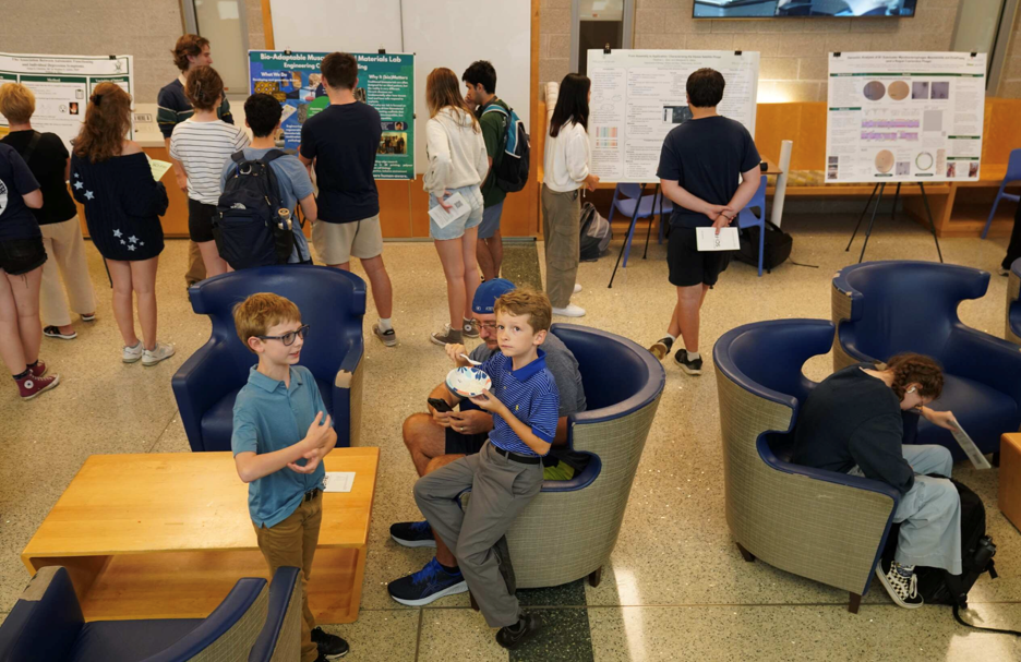 From the youngest community members to retirees, all ages enjoy this open night of science. Photo by Stephen Salpukas.