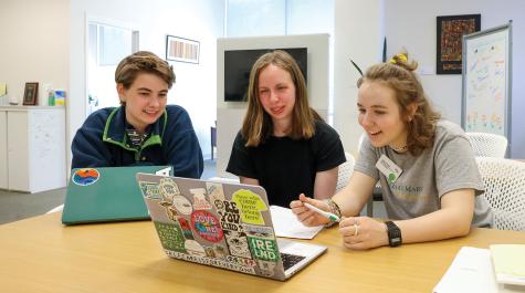 FOR THE LOVE OF WRITING: Writing center consultants Chloe Wright ’25 (left), Mary Beth Bauermann ’24 (center) and Ciara Curtin ’24. Bauermann was also a university marketing communications intern in 2023 and 2024.