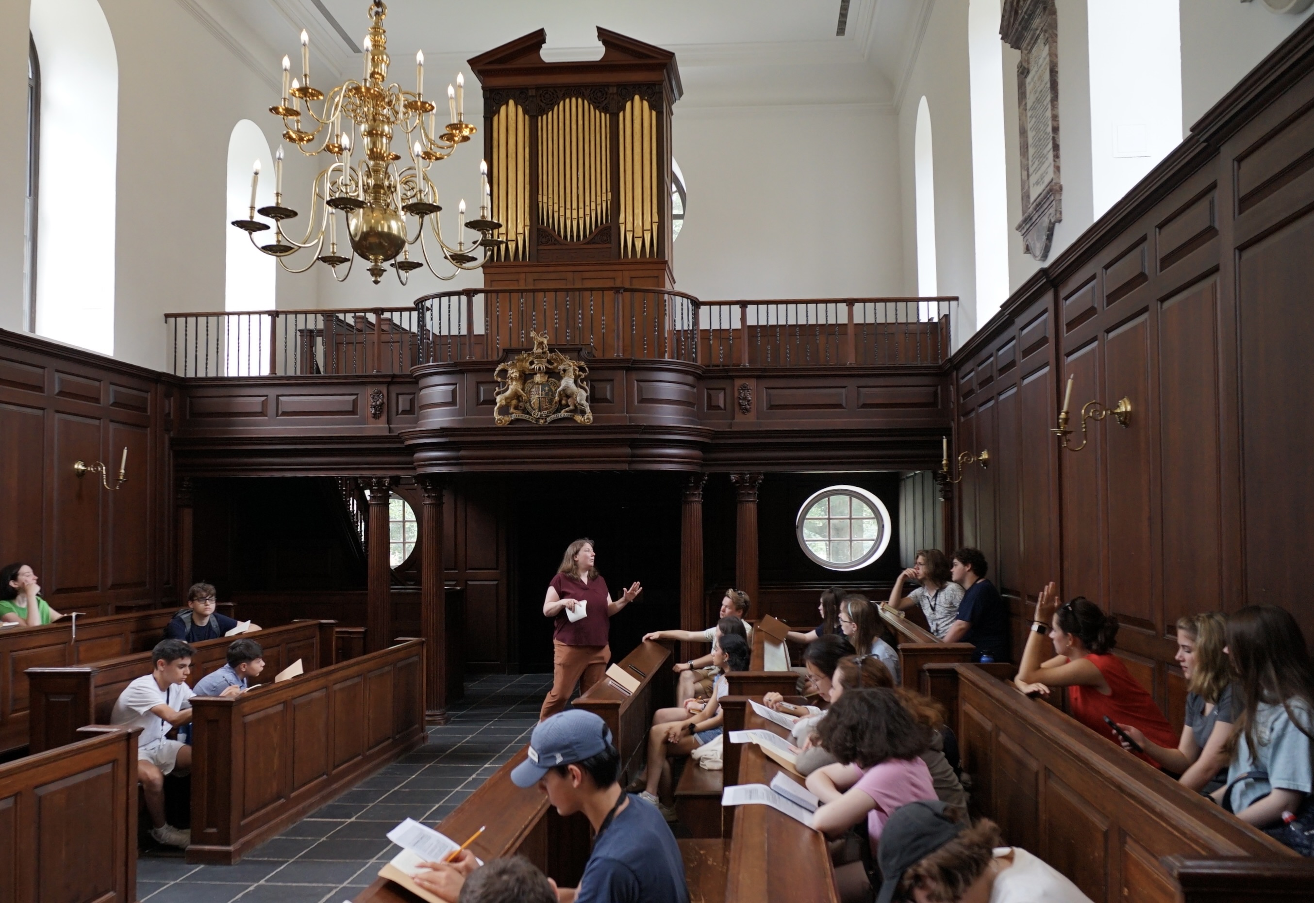 Robyn Schroeder, assistant director of NIAHD, teaches students in The Road to American Revolution course about the colonial uses of the Wren Chapel. Photo by Rebecca Ries '27.