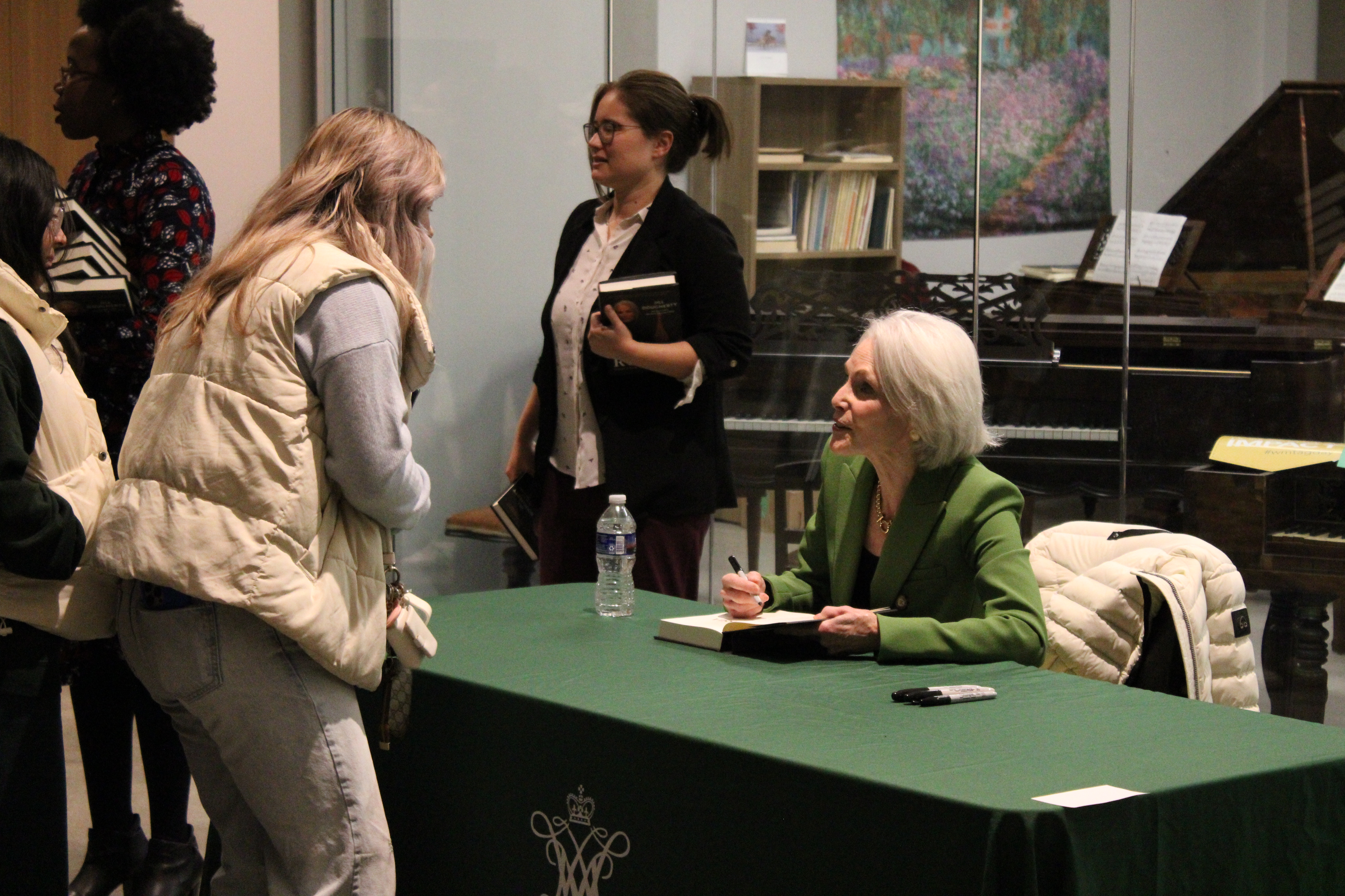 After her talk, Jill Dougherty answered questions from the audience and signed copies of her book. Photo by Alexus Kruse.