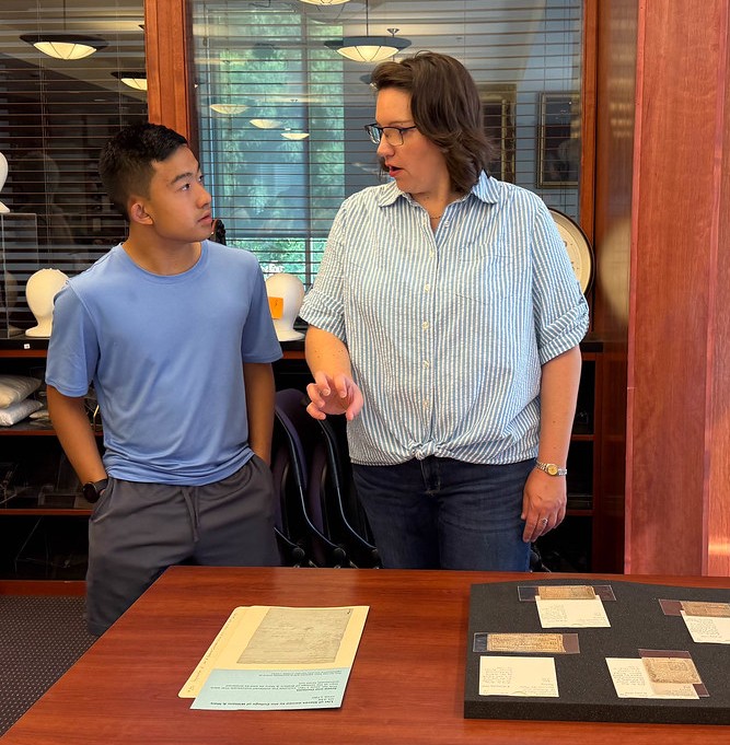 Pre-College Student with Dr. Sarah McCartney in Special Collections at Swem Library, 2025