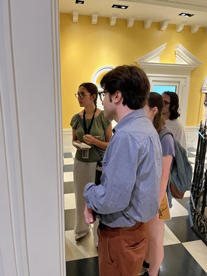 Instructor Elliot Warren talking with History 217 students, 2023